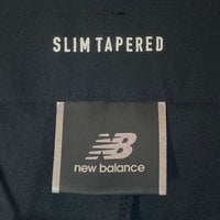 new balance ニューバランス SLIM TAPERED スリムテーパード ストレッチパンツ ブラック AMP35003 Size L 瑞穂店