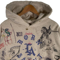 SAINT Mxxxxxx セントマイケル 24SS BORN×RAISED ボーンアンドレイズド HOODIE LA USED/ダメージ加工 プルオーバースウェットパーカー グレー SM-YS8-0000-C11 Size L 福生店