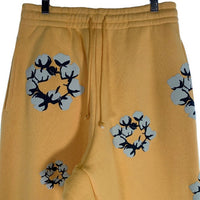 DENIM TEARS デニムティアーズ 24AW CPFM カクタスプラントフリーマーケット Wreath Sweatpants リース プリント スウェットパンツ イエロー Size M 福生店