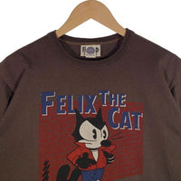 TOYS McCOY トイズマッコイ フィリックス レッドジャケット プリントTシャツ チャコール Size L 福生店