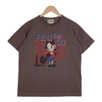 TOYS McCOY トイズマッコイ フィリックス レッドジャケット プリントTシャツ チャコール Size L 福生店