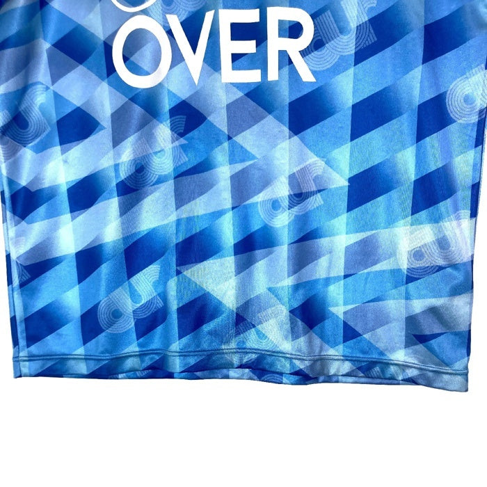 UMBRO アンブロ ×(C)OVER FOOTBALL SHIRT ブルー 総柄 sizeM 瑞穂店
