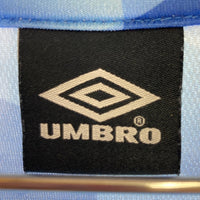 UMBRO アンブロ ×(C)OVER FOOTBALL SHIRT ブルー 総柄 sizeM 瑞穂店