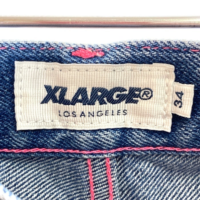 X-LARGE エクストララージ NEON STITCHED ペンキロゴ ピンクステッチ デニムパンツ インディゴ size34 瑞穂店