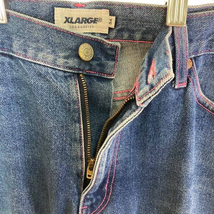 X-LARGE エクストララージ NEON STITCHED ペンキロゴ ピンクステッチ デニムパンツ インディゴ size34 瑞穂店