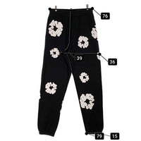 DENIM TEARS デニムティアーズ COTTON WREATH SWEAT PANTS コットンリース スウェットパンツ ブラック フラワーホワイト Size XL 福生店