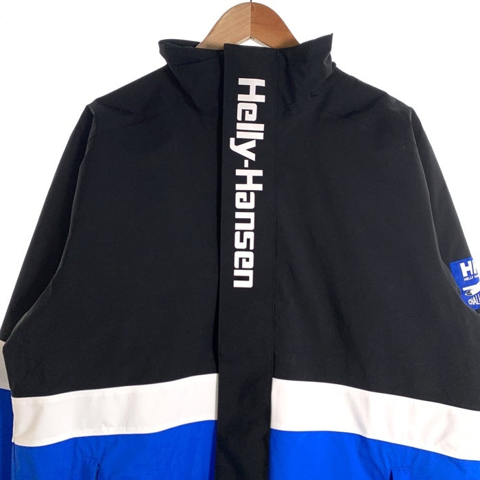 CHALLENGER チャレンジャー HELLY HANSEN ヘリーハンセン 26SS Racing Jacket ビッグロゴ レーシング ジャケット ブラック ブルー HH12640X1 Size L 福生店
