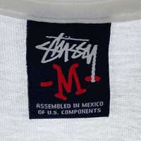 STUSSY ステューシー LEAVE ME ALONE ロゴモチーフ Tシャツ ホワイト sizeM 瑞穂店