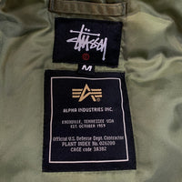 STUSSY ステューシー 05AW ALPHA アルファ MA-1 25周年 カスタム フライトジャケット フラグメント オリーブ Size M TALL 福生店