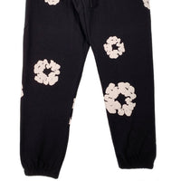 DENIM TEARS デニムティアーズ COTTON WREATH SWEAT PANTS コットンリース スウェットパンツ ブラック フラワーホワイト Size XL 福生店