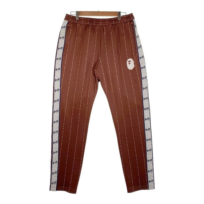 A BATHING APE アベイシングエイプ Text Stripe Jersey Pants サイドライン ジャージパンツ ブラウン 001PTH701005J Size XL 福生店