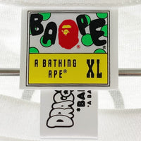 A BATHING APE アベイシングエイプｘDRAGON BALL Z ドラゴンボールZ BABY MILO MR SATAN&CELL ミスターサタン セル ホワイト sizeXL 瑞穂店