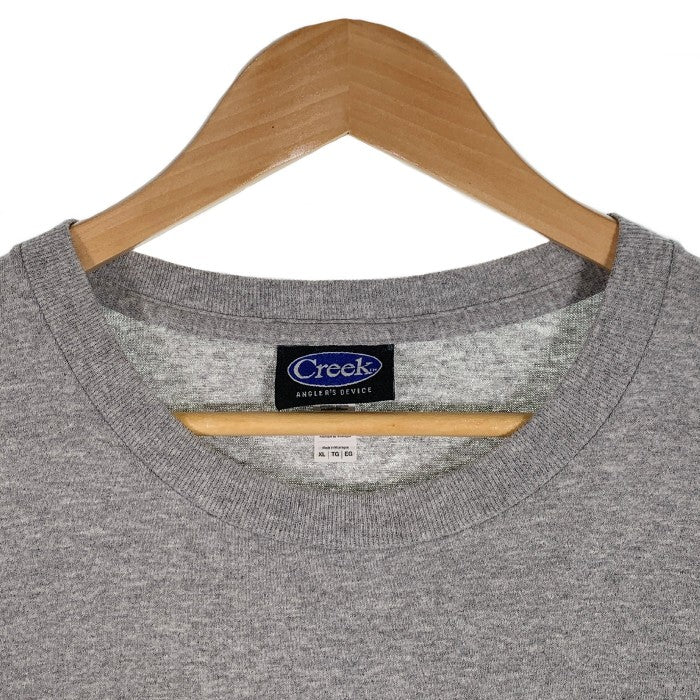 Creek Angler's Device クリーク NATURE APPEARS AS A SYMBOL プリントTシャツ グレー Size XL 福生店